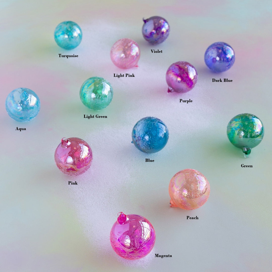 4-inch glass ornament with iridescent ripple finish