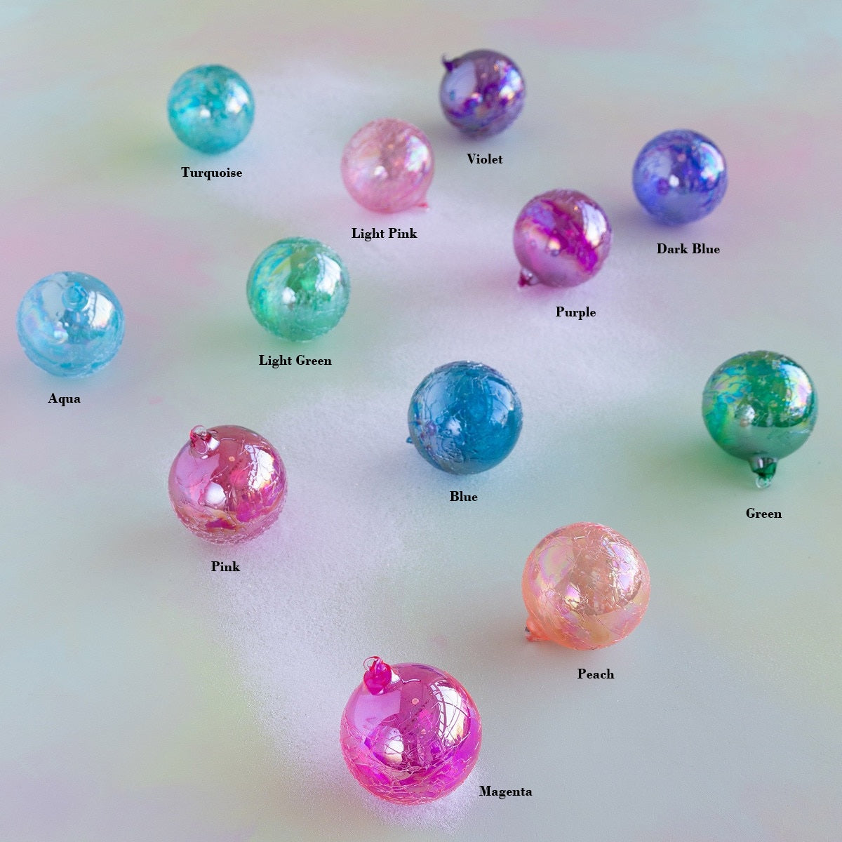 4-inch glass ornament with iridescent ripple finish
