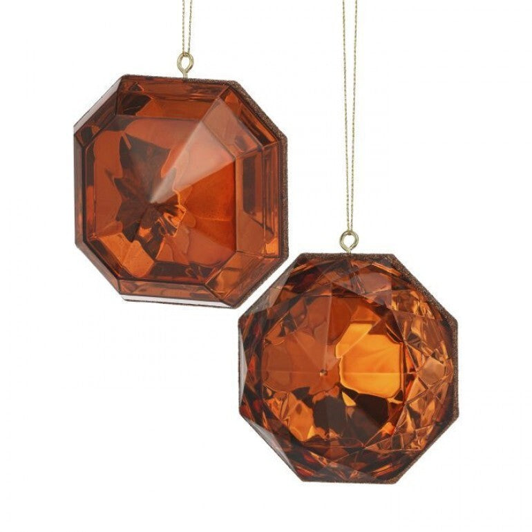 Two 4-inch amber acrylic precious gem ornaments with faceted surfaces and gold hanging strings.