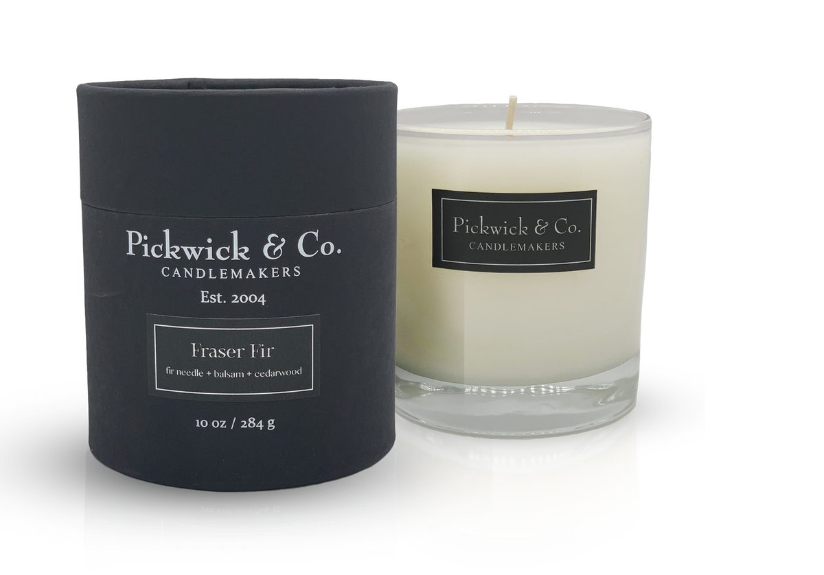 Pickwick Candle in a clear glass jar with a white wick.