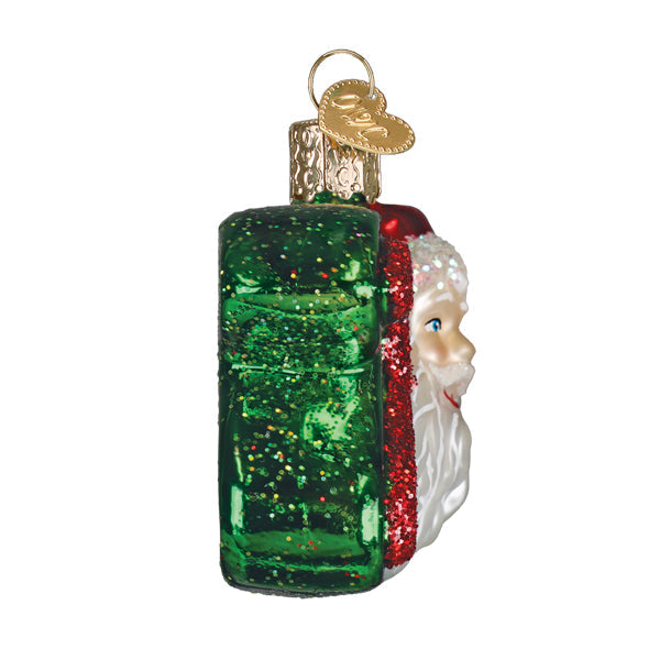 Red glass Santa ornament with white beard, black hat trim, gold bell detail, and silver cap.