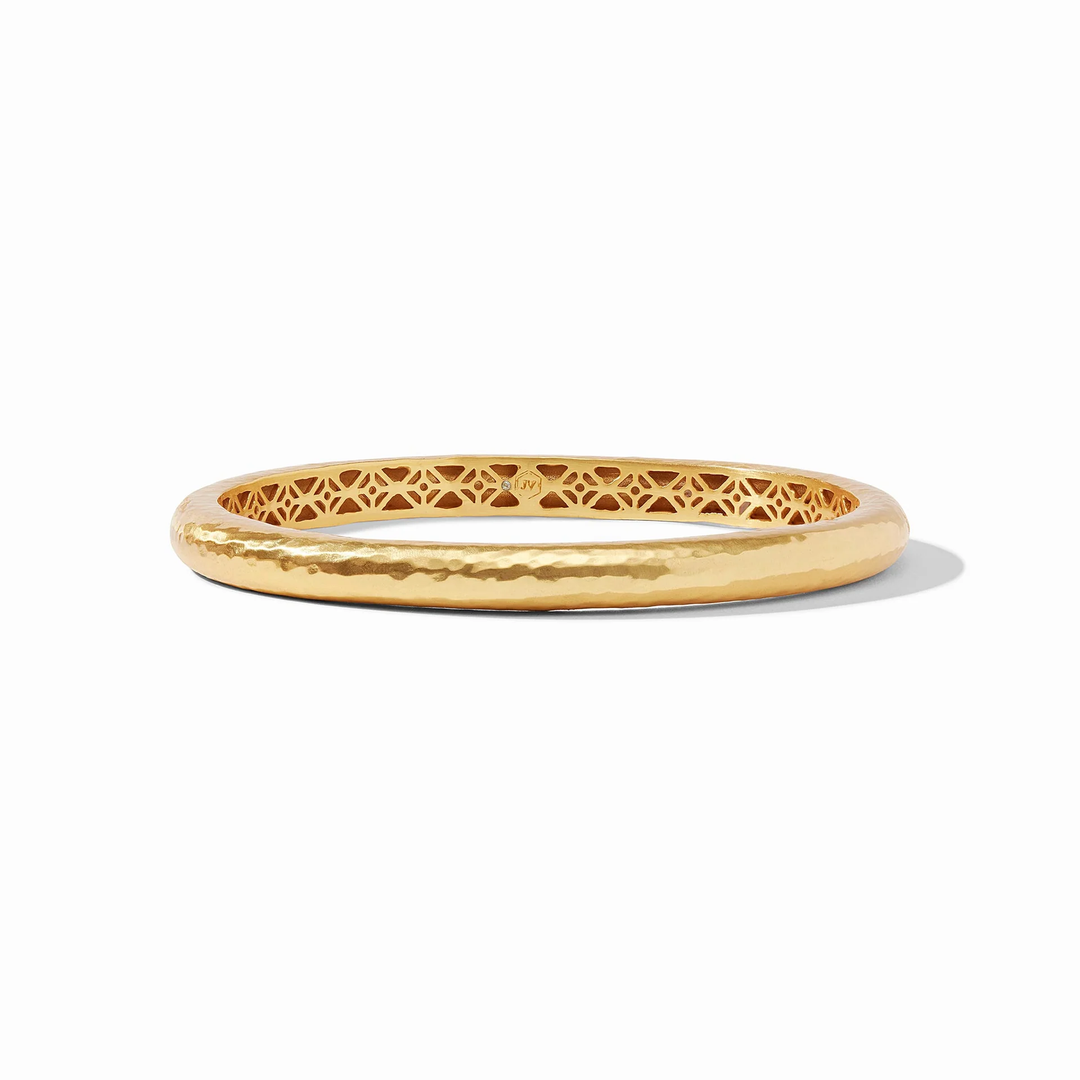 Havana bangle with lightly hand-hammered finish and ornate geometric piercework interior.