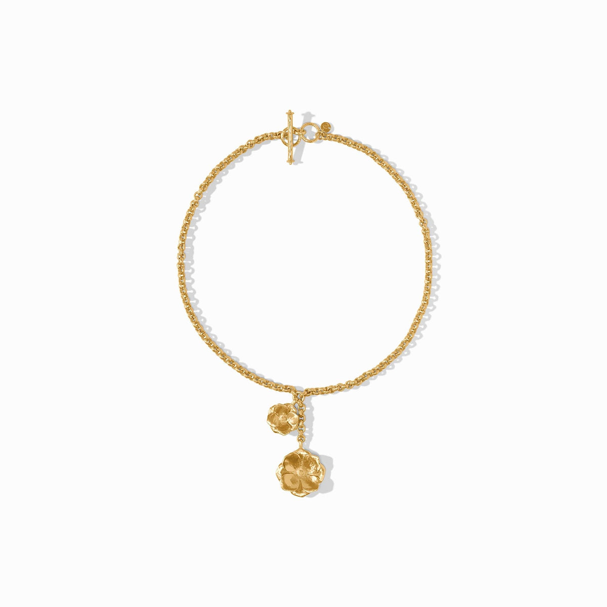 Gold Bloom Lariat Necklace featuring a toggle clasp and two tiered flower pendants.