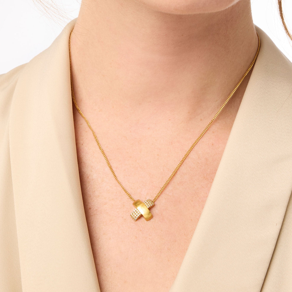 Model wearing a Catalina X Pavé Delicate Necklace in 24K gold plate with CZ accents.