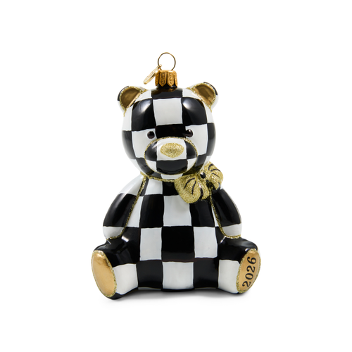 Black and white checkered glass bear ornament with gold glitter accents and 2026 on the foot.