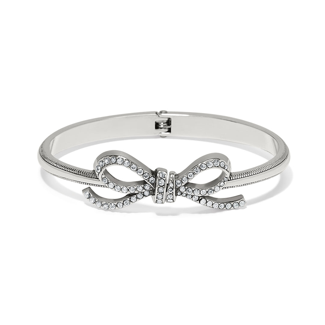 Silver plated Illumina Bow Hinged Bangle featuring fine quality crystals on a bow motif.