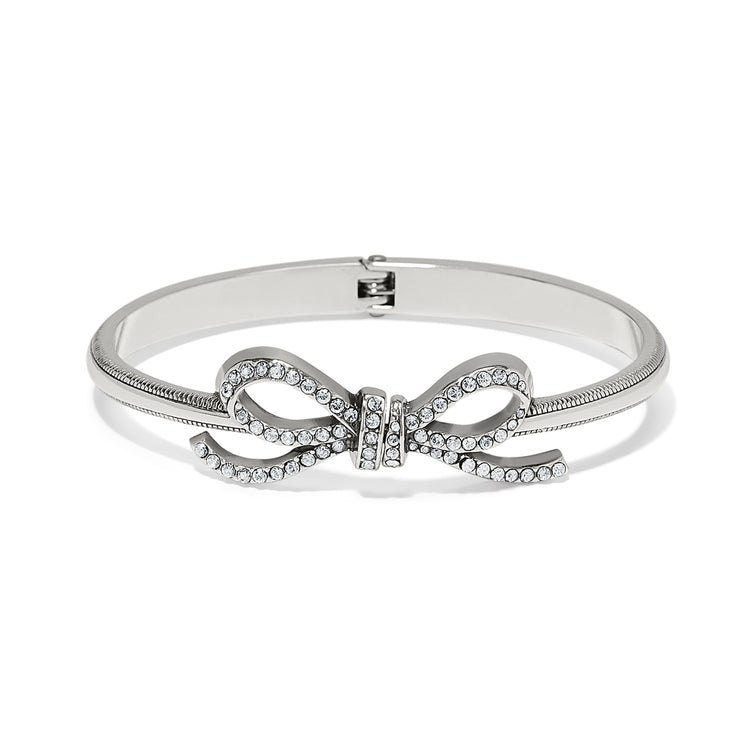 Silver plated Illumina Bow Hinged Bangle featuring fine quality crystals on a bow motif.