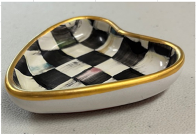 Small heart-shaped trinket dish with black and white Courtly Check pattern and gold-painted rim.