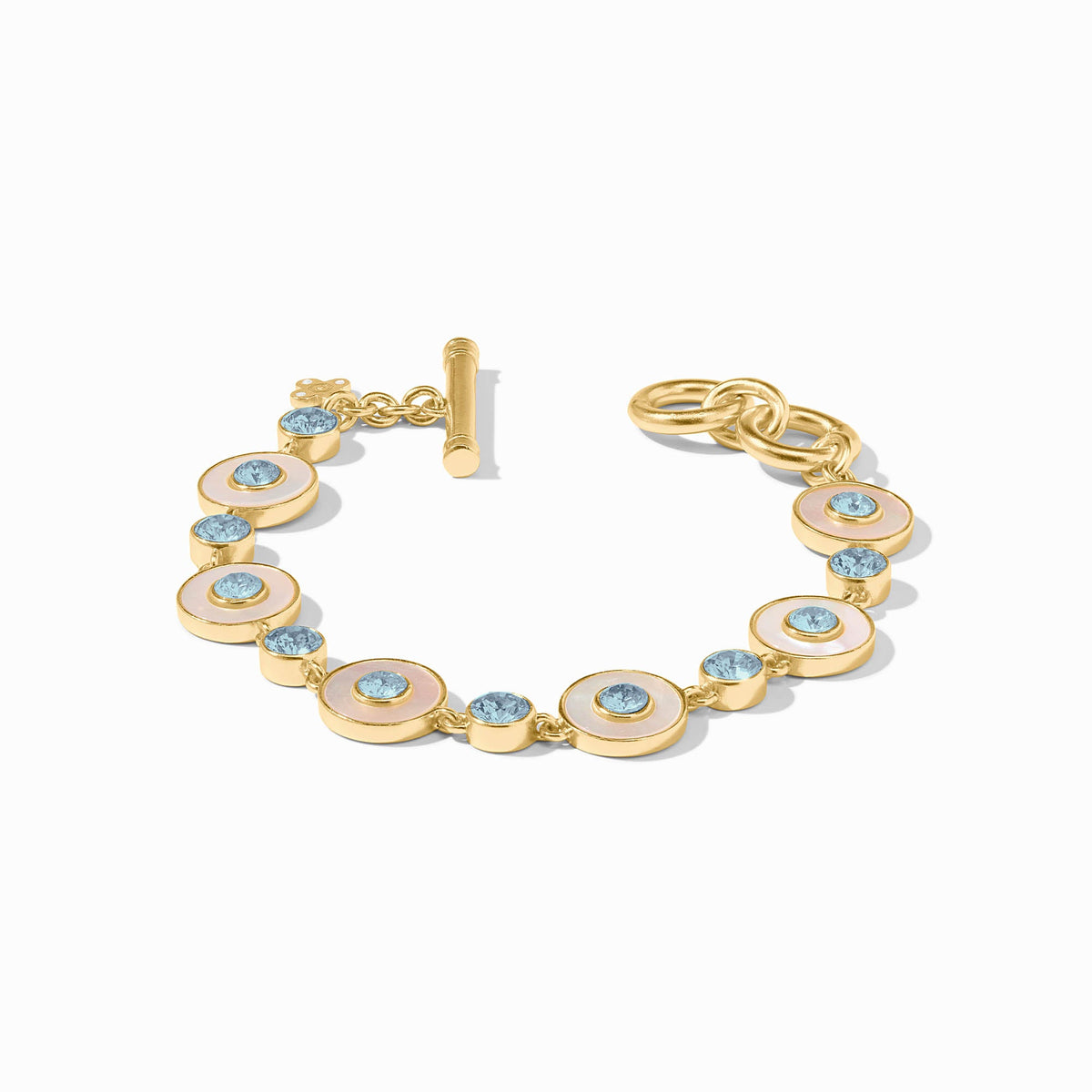 Adjustable Colette tennis bracelet featuring a gold-plated chain with mother-of-pearl accents and cubic zirconia stones.