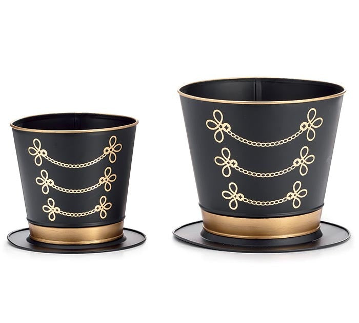 Gold-accented nutcracker hat planter with decorative band holding a small plant