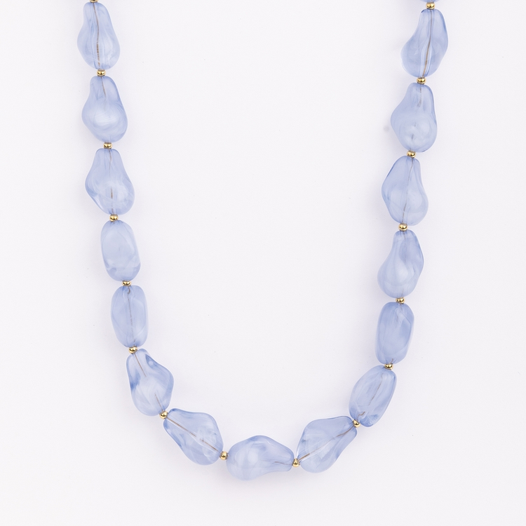 Cami Necklace featuring irregular light blue translucent beads separated by small gold spacers.