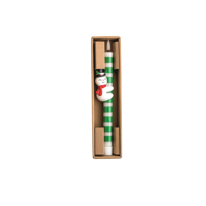 Flameless green and white striped taper candle with a snowman hugger in a brown gift box.