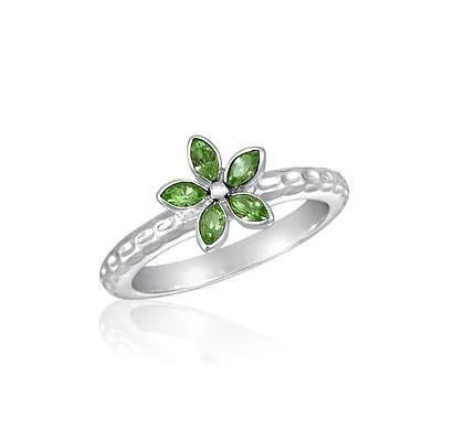 Silver stack ring with a flower design featuring five green marquise-cut stones.
