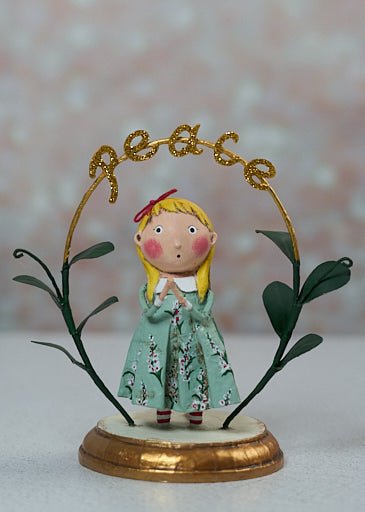 Seven-inch poly resin figurine titled Praying for Peace with a serene silhouette.