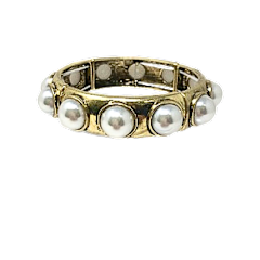 Pearl stretch cuff bracelet featuring faux pearls in a sleek silver-tone finish.