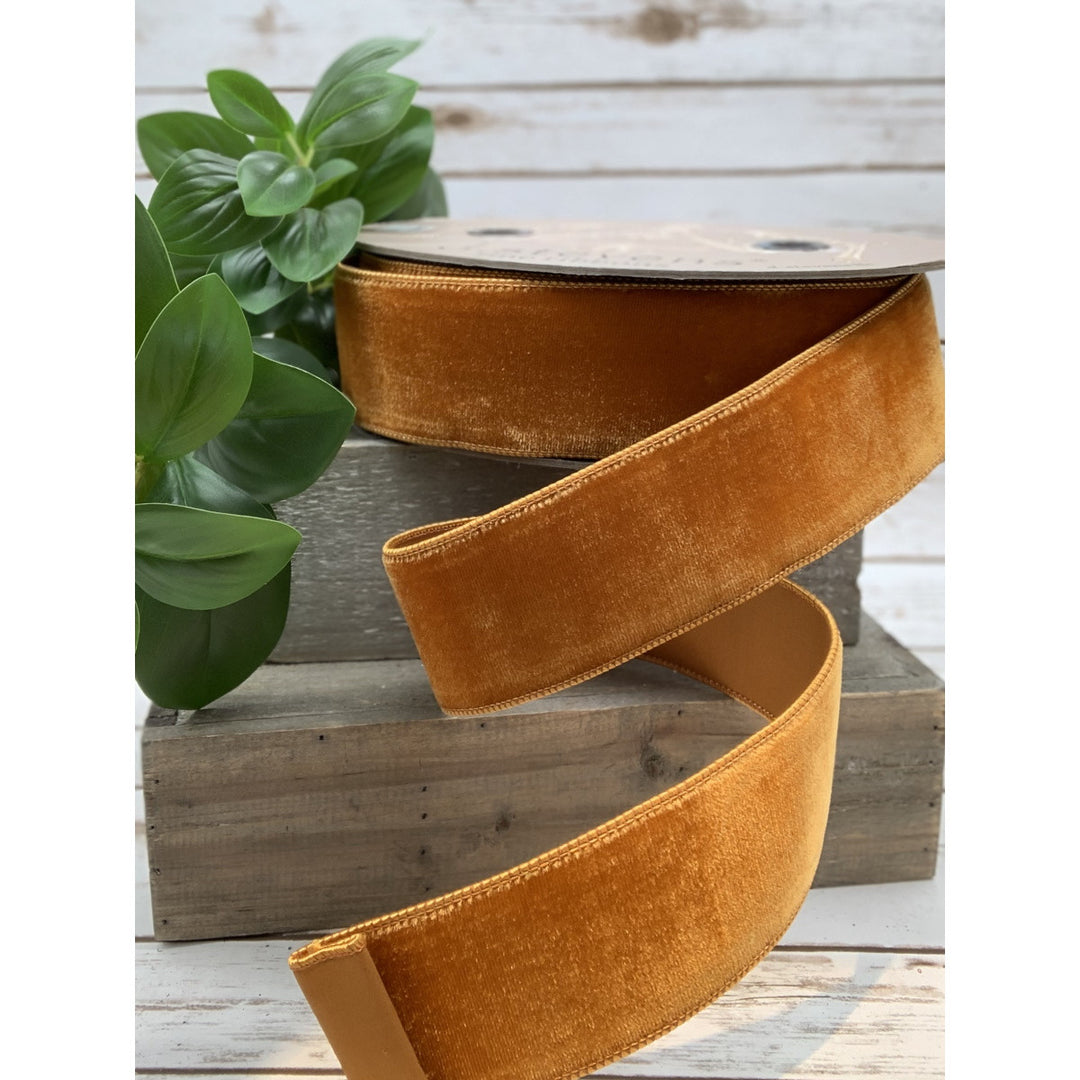 Bittersweet velvet ribbon with dupion backing in a solid color.