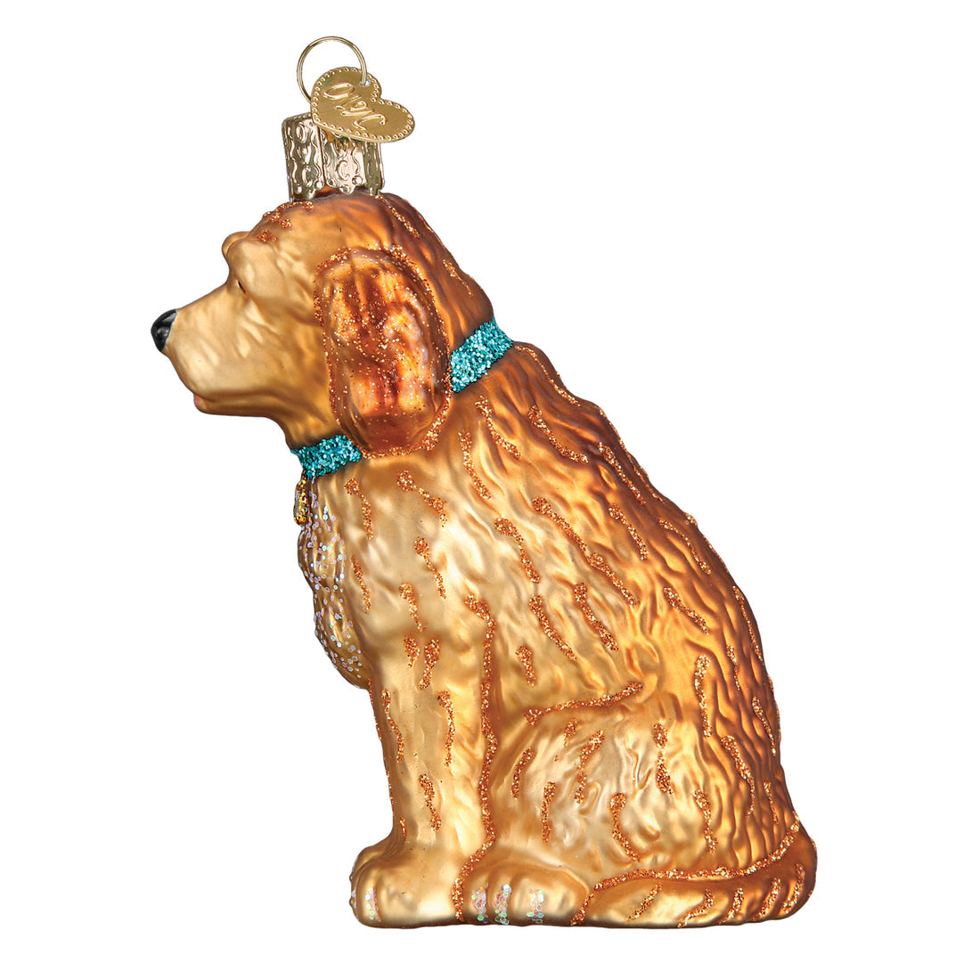 Glass Irish Doodle Christmas ornament featuring a golden-brown dog with a sparkly teal collar.