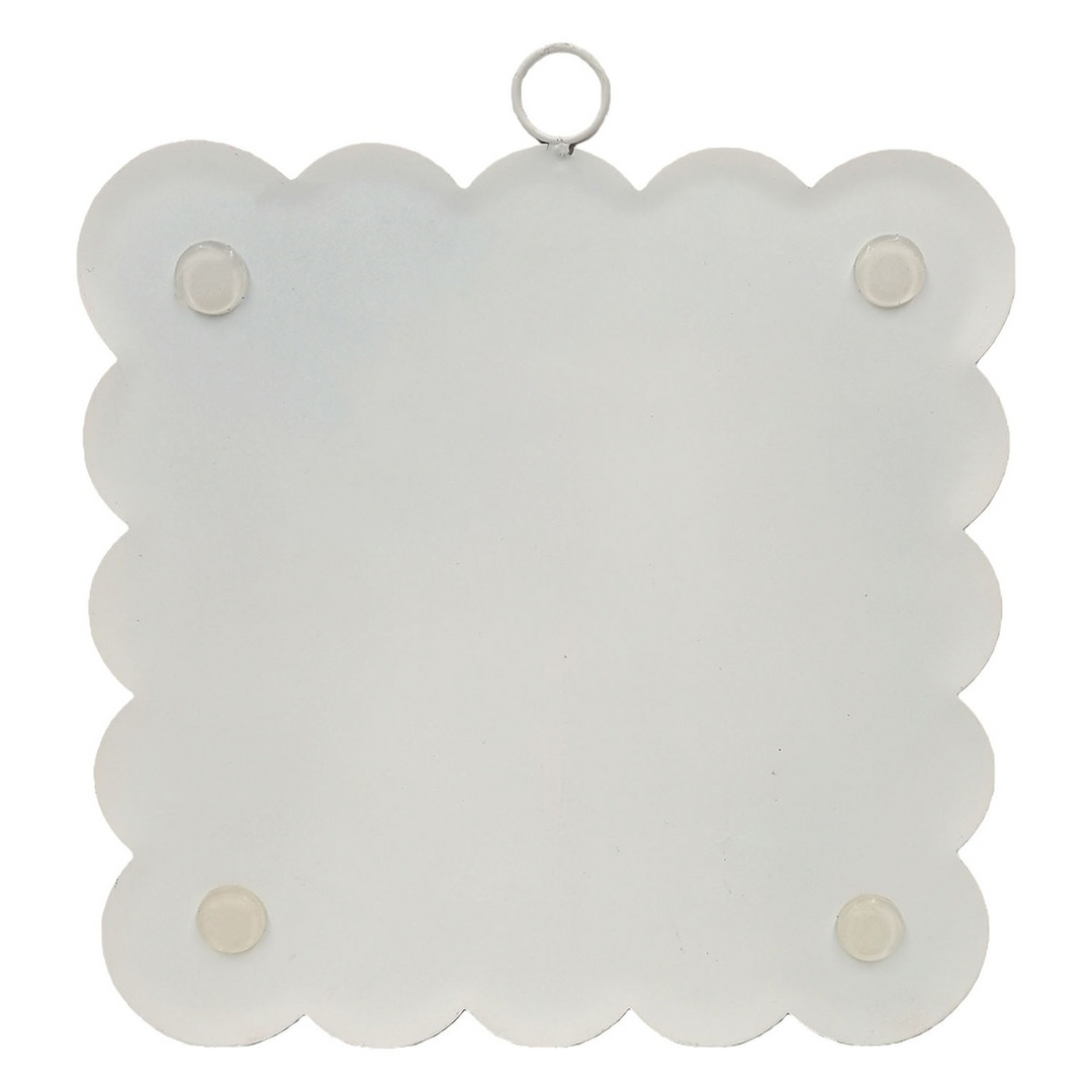 Back view of a white scalloped square wall hanging with a top metal ring and four corner bumpers.