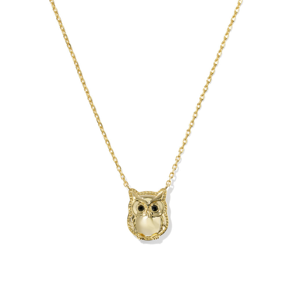 Gold owl pendant necklace with black obsidian eyes on a delicate chain.
