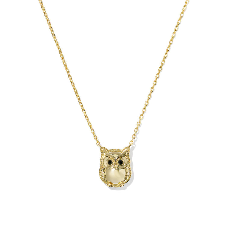 Gold owl pendant necklace with black obsidian eyes on a delicate chain.