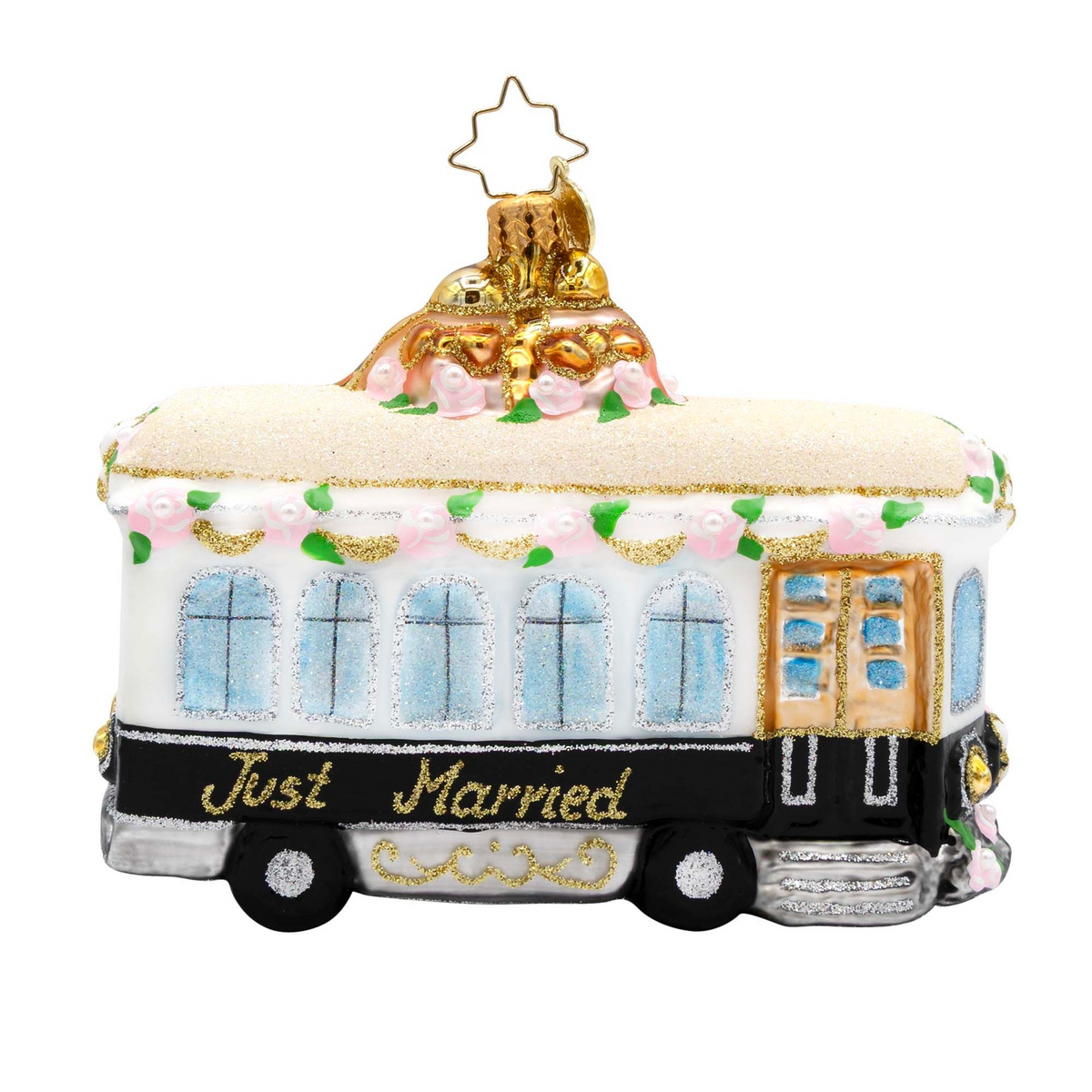 Glass trolley ornament with pink roses, glitter accents, and "Just Married" written on the side.