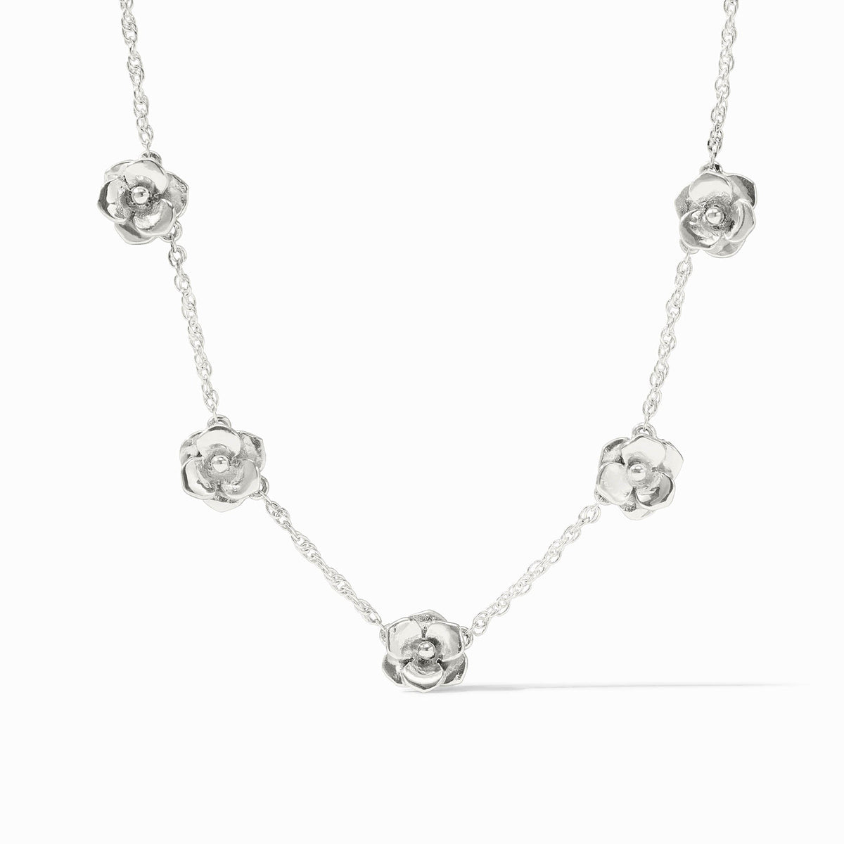 Adjustable silver plate necklace with lobster clasp featuring a delicate floral pendant.