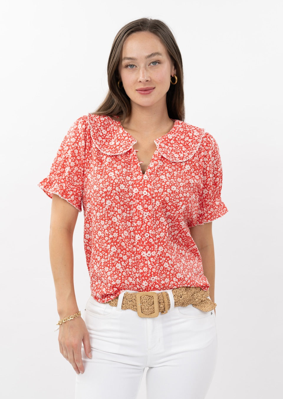 White Olivia Ditsy Poet Top with Peter Pan collar, lace trim, and ruffled short sleeves.