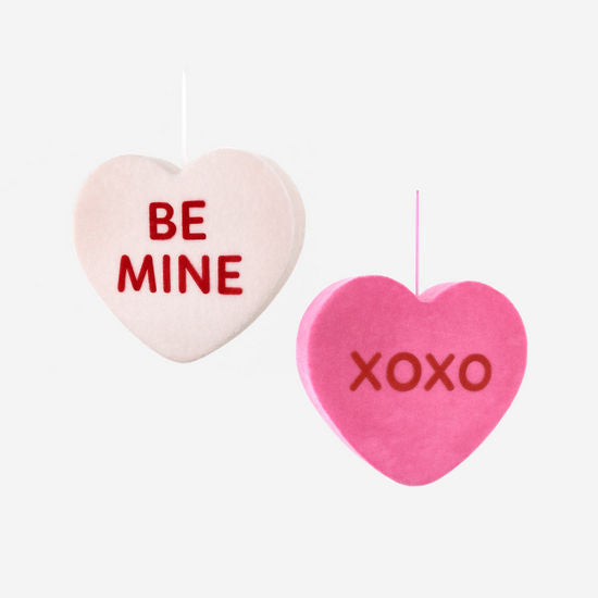 PVC flocked conversation heart jumbo balloon in pastel pink with white polka dots.