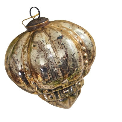 Antique gold glass ornament with beaded detailing in a square shape.
