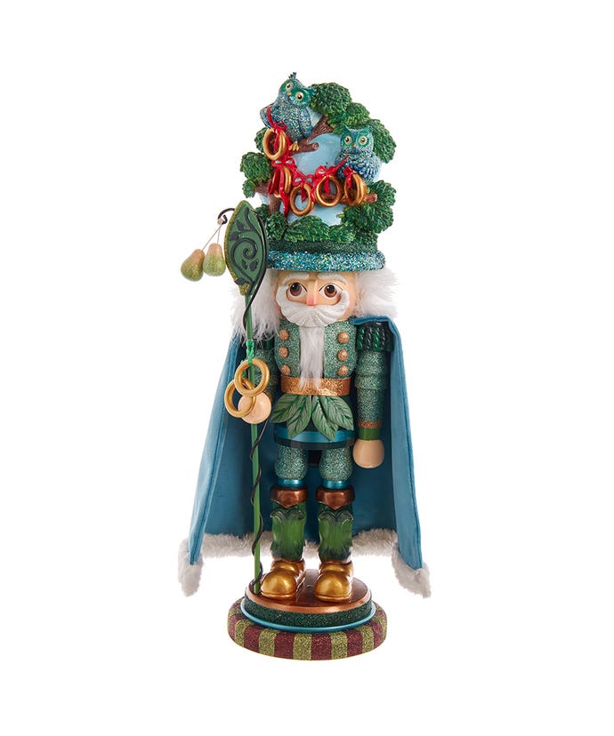 17.5-inch Hollywood Nutcracker with five golden rings on a glittered tree hat and a blue cape.