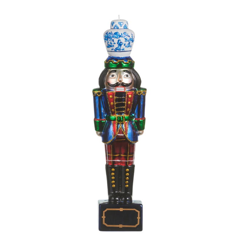 8-inch glass nutcracker ornament with a blue jacket, plaid pants, and a blue and white ginger jar hat