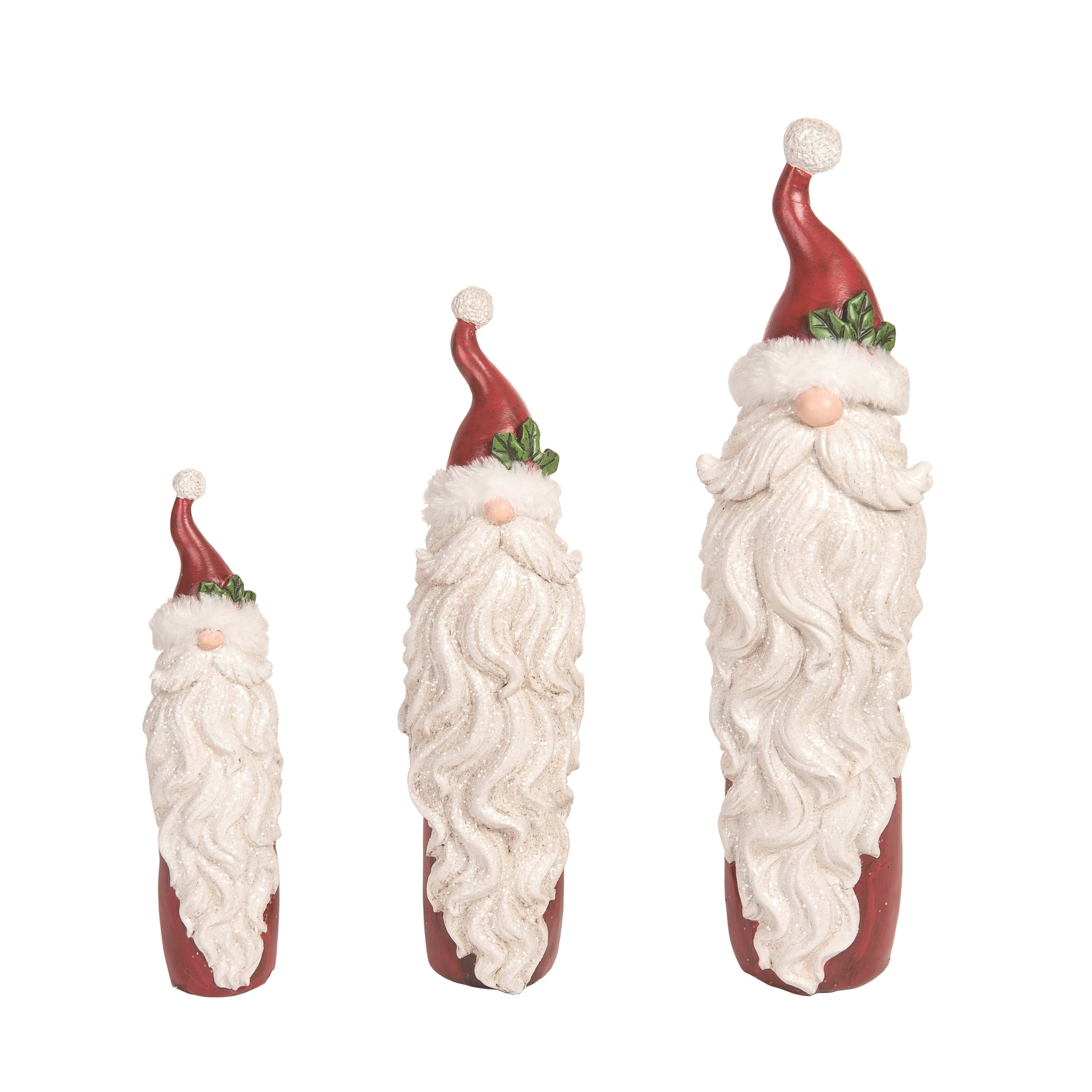 Three resin Santa figurines in varying heights with long white beards and red hats.