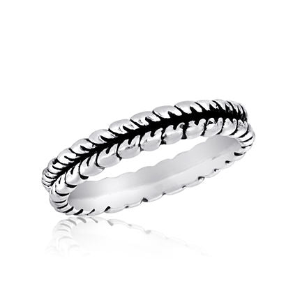 Silver Leaf Stack Ring with delicate leaf motifs wrapped around a sleek band.