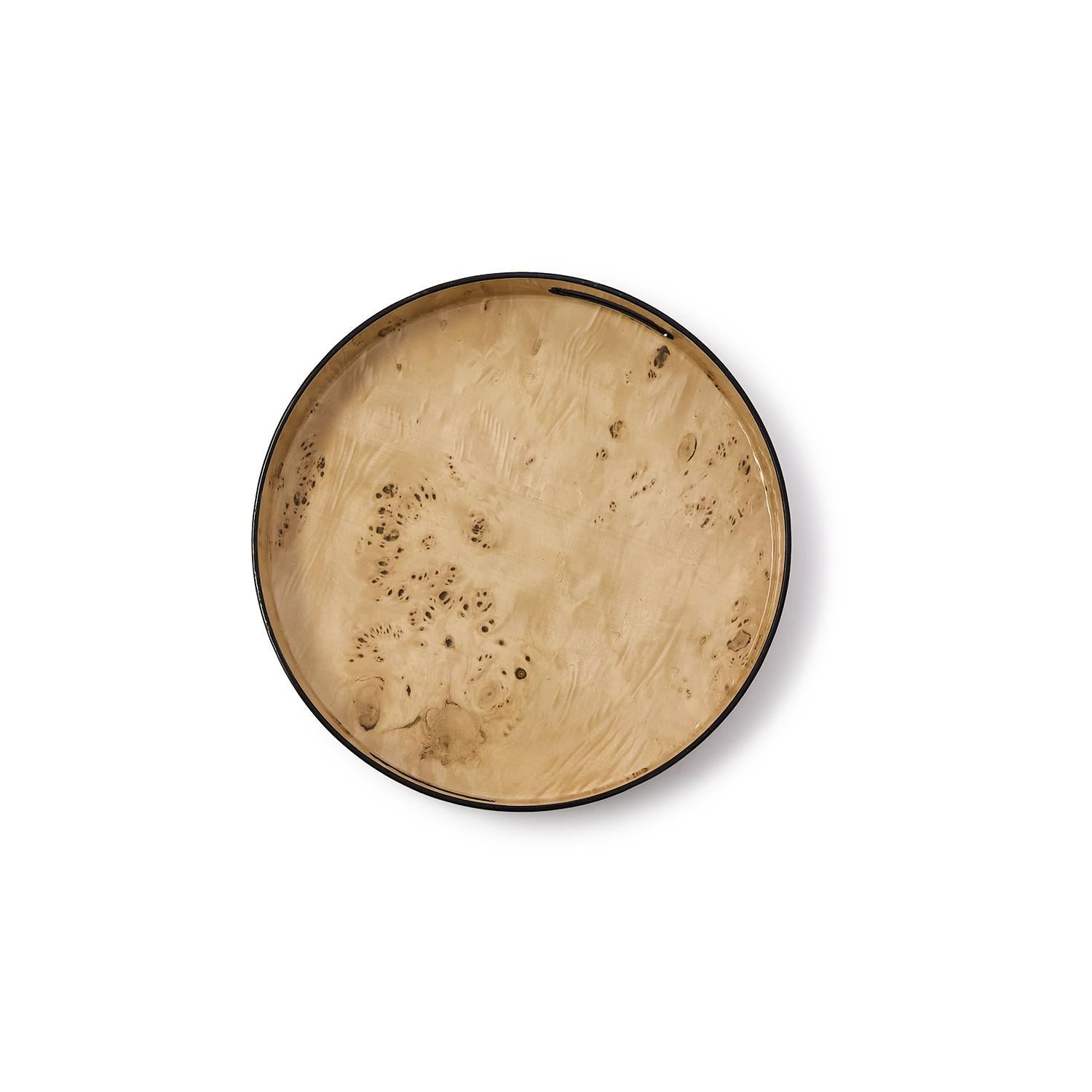 Top view of a round tray featuring a light tan burled wood pattern with a thin black rim.