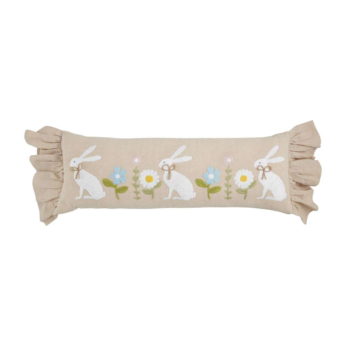 Two chambray pillows featuring embroidered bunny designs in a soft neutral tone.