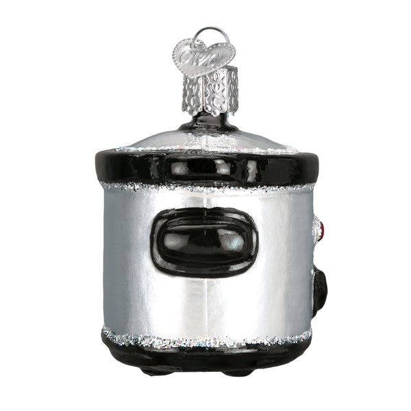 Silver and black glass slow cooker Christmas ornament with glitter accents and a heart-shaped tag.
