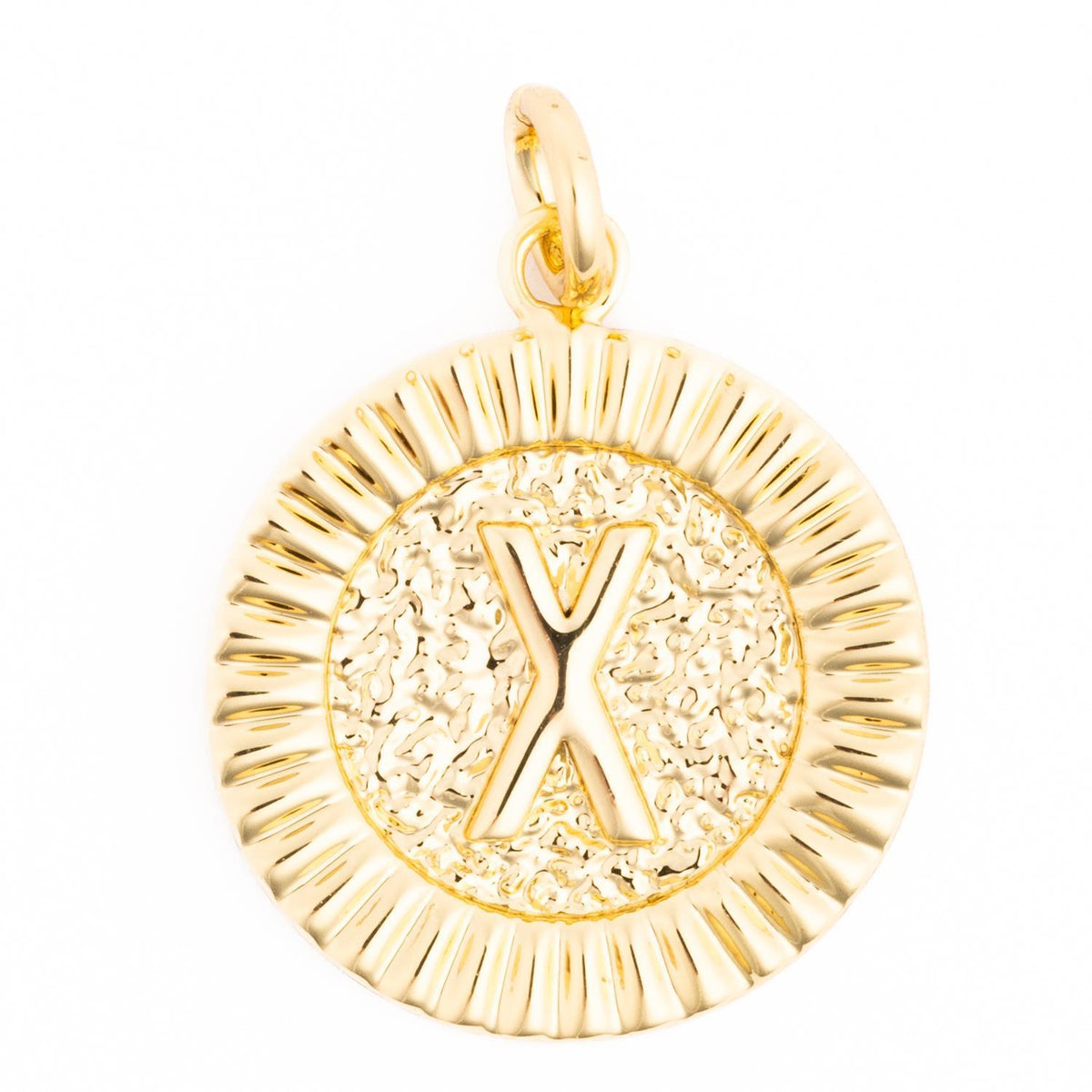 Gold round Mckenna charm with a textured center featuring the letter X and a fluted border.