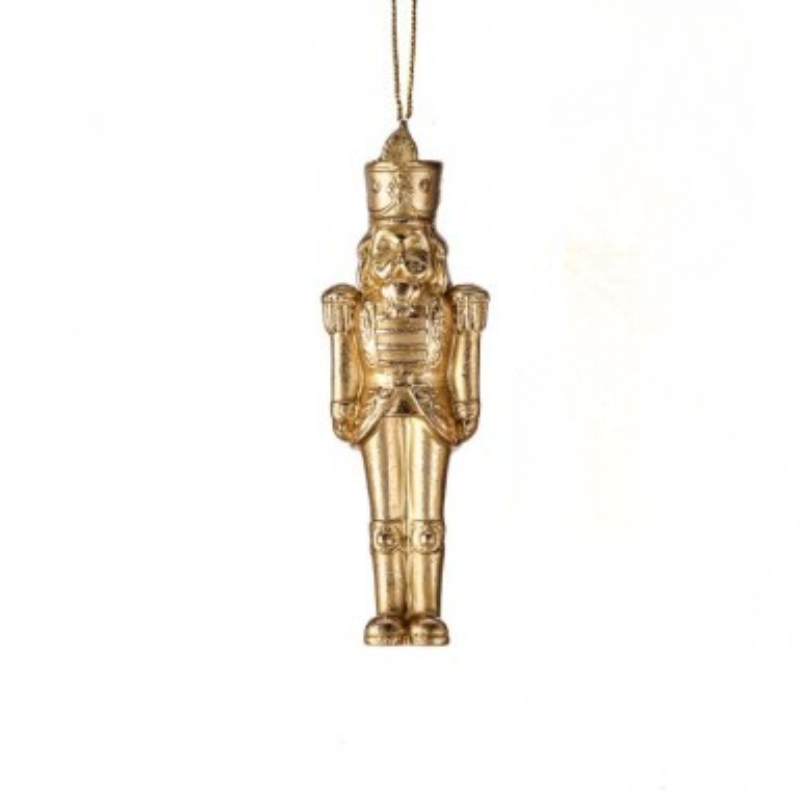 4-inch gold resin nutcracker Christmas ornament with intricate gilded details and hanging string.