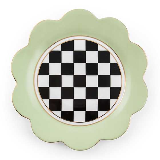 Butterfly Toile Dinner Plate with a light green scalloped rim and black and white checkered center.