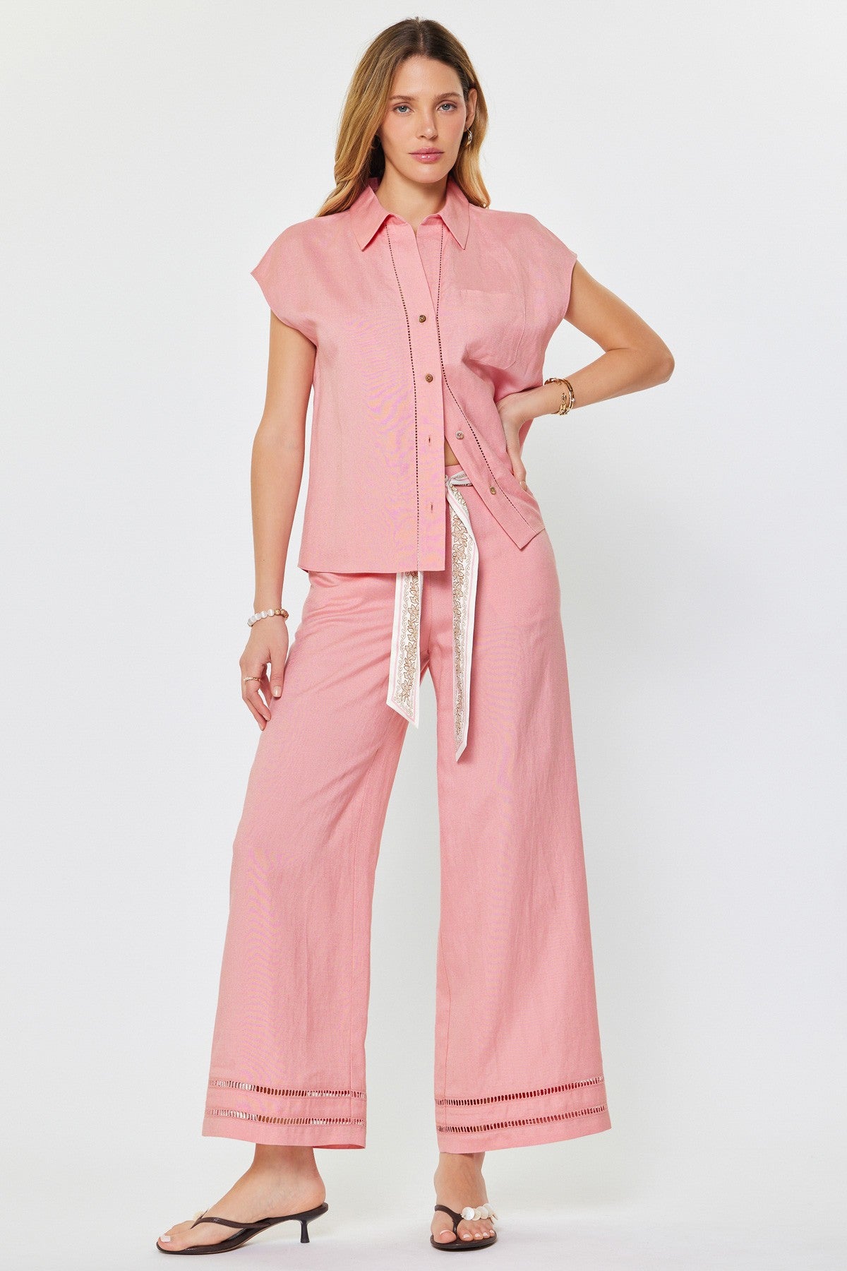Madison cap-sleeve button-down blouse in a light neutral linen-rayon blend with a relaxed silhouette.