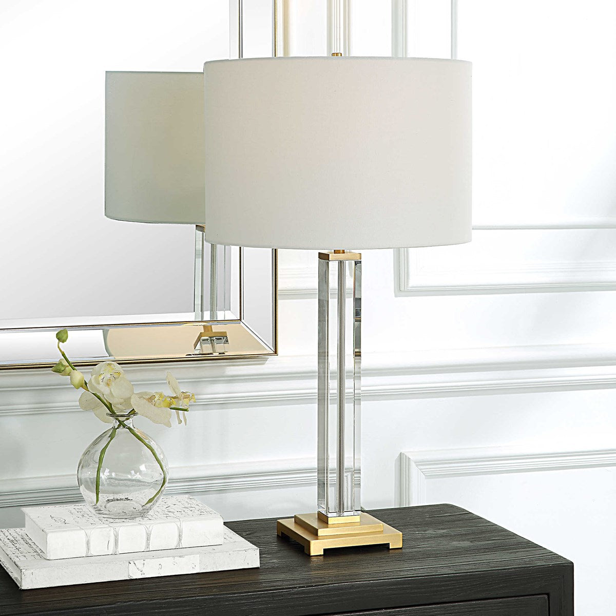 Crystal column table lamp with a clear glass shade measuring 10 inches high by 15 inches in diameter.