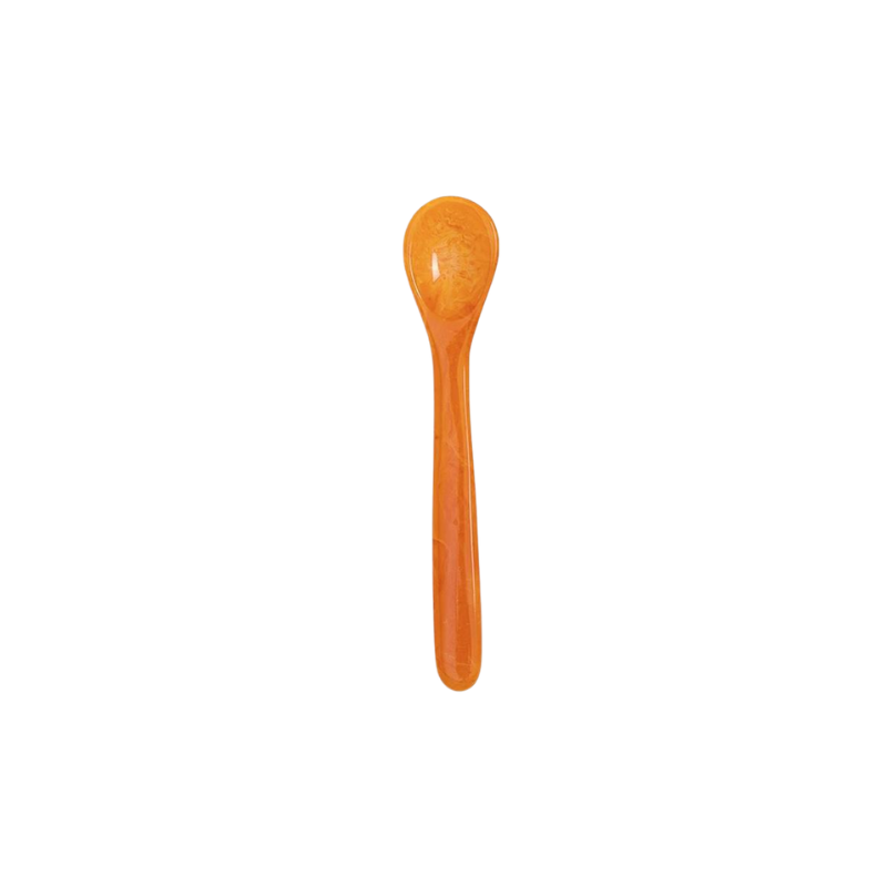 Orange marbled resin Color Pop Spoon with a rounded bowl and slim handle.