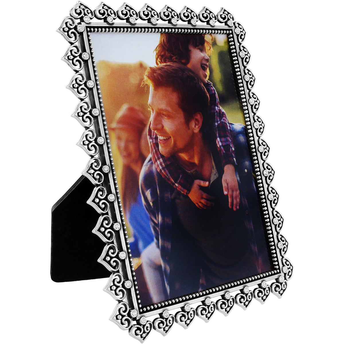 Silver plated crystal heart frame holding a photo