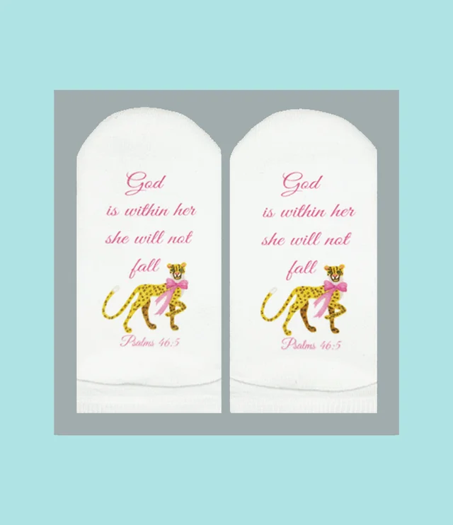White socks featuring the text 'God is within her she will not fall' and a cheetah with a pink bow.