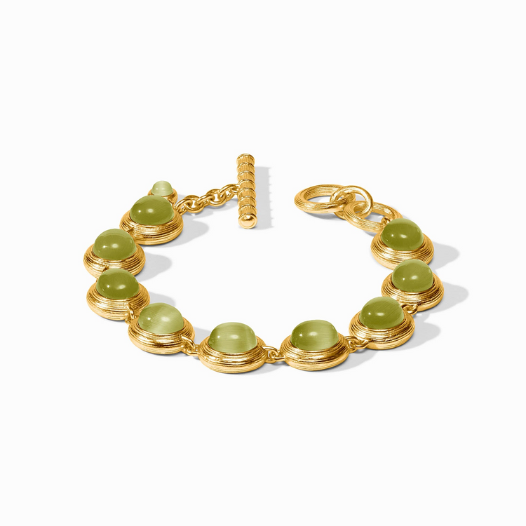 Gold-plated Cobblestone Tennis Bracelet with green glass cabochons and a toggle closure.