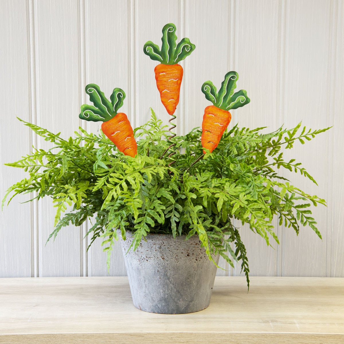 Three Carrot Stake measuring twelve inches by one inch with a sixteen-inch length.