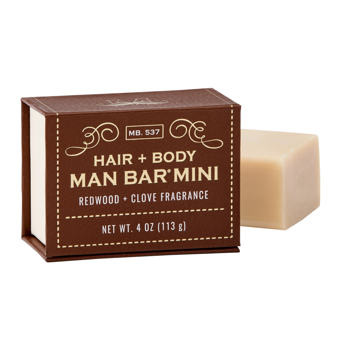 Man Bar Mini Hair & Body in Redwood & Clove scent with a dark bottle and white cap.