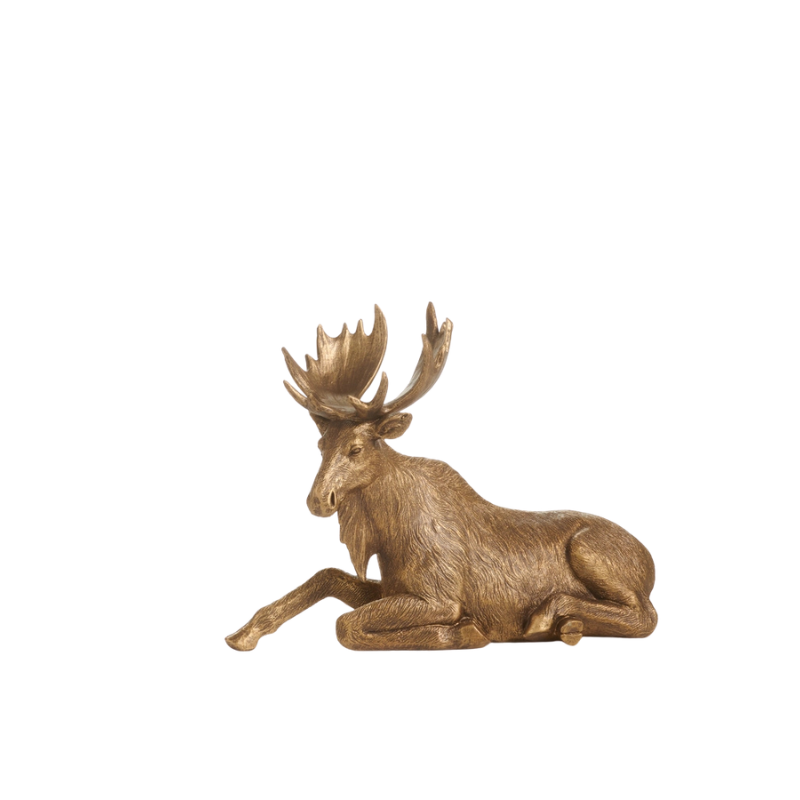 Antique gold moose figurine in a resting pose with large antlers, 11.75 inches tall.