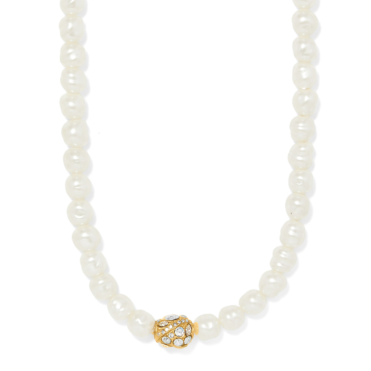 Trust Your Journey pearl necklace with white baroque pearls and a gold crystal-encrusted bead.