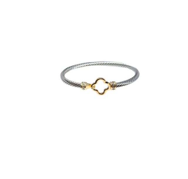 Two-tone silver rope bangle with a gold quatrefoil clasp and cubic zirconia accents.